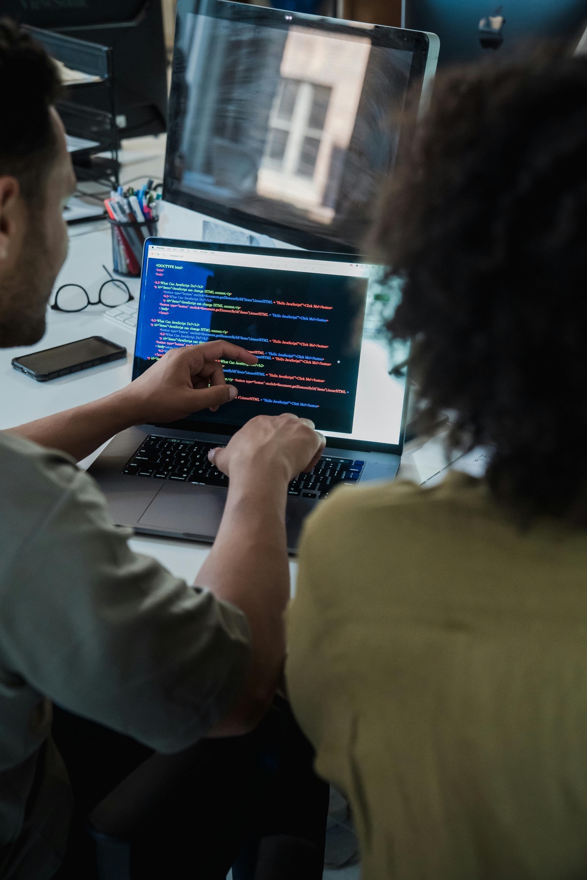Developers reviewing software code together